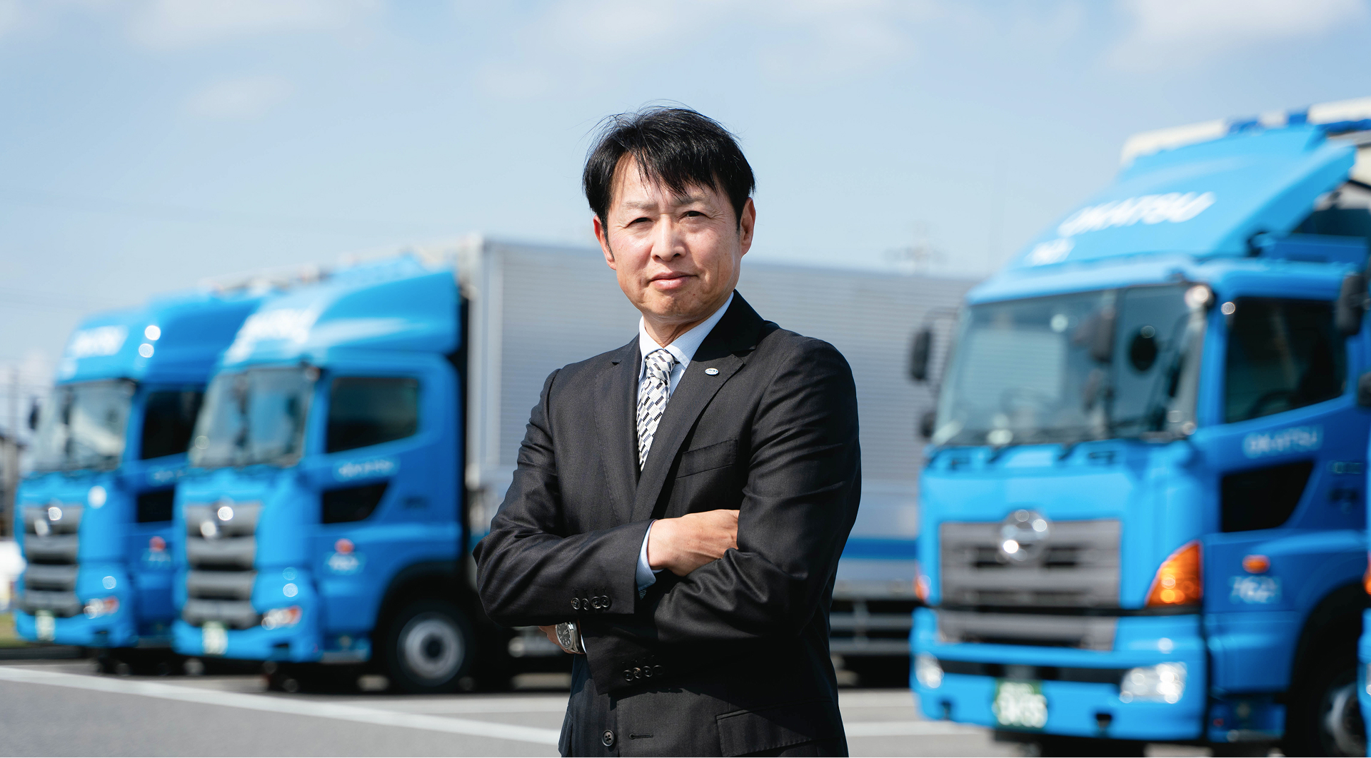笑顔の社長の写真